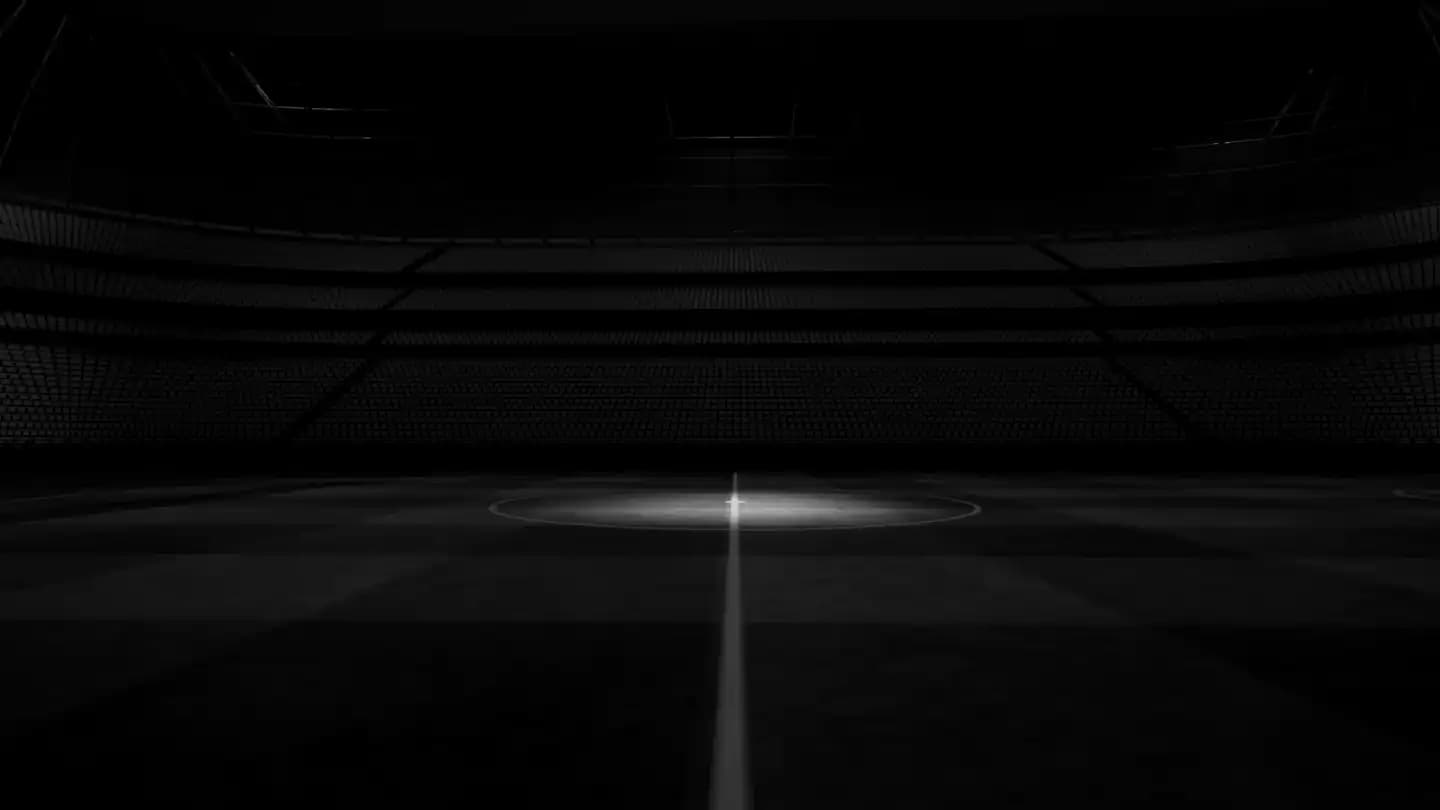 Trainer erklärt einer Gruppe junger Spieler eine Übung